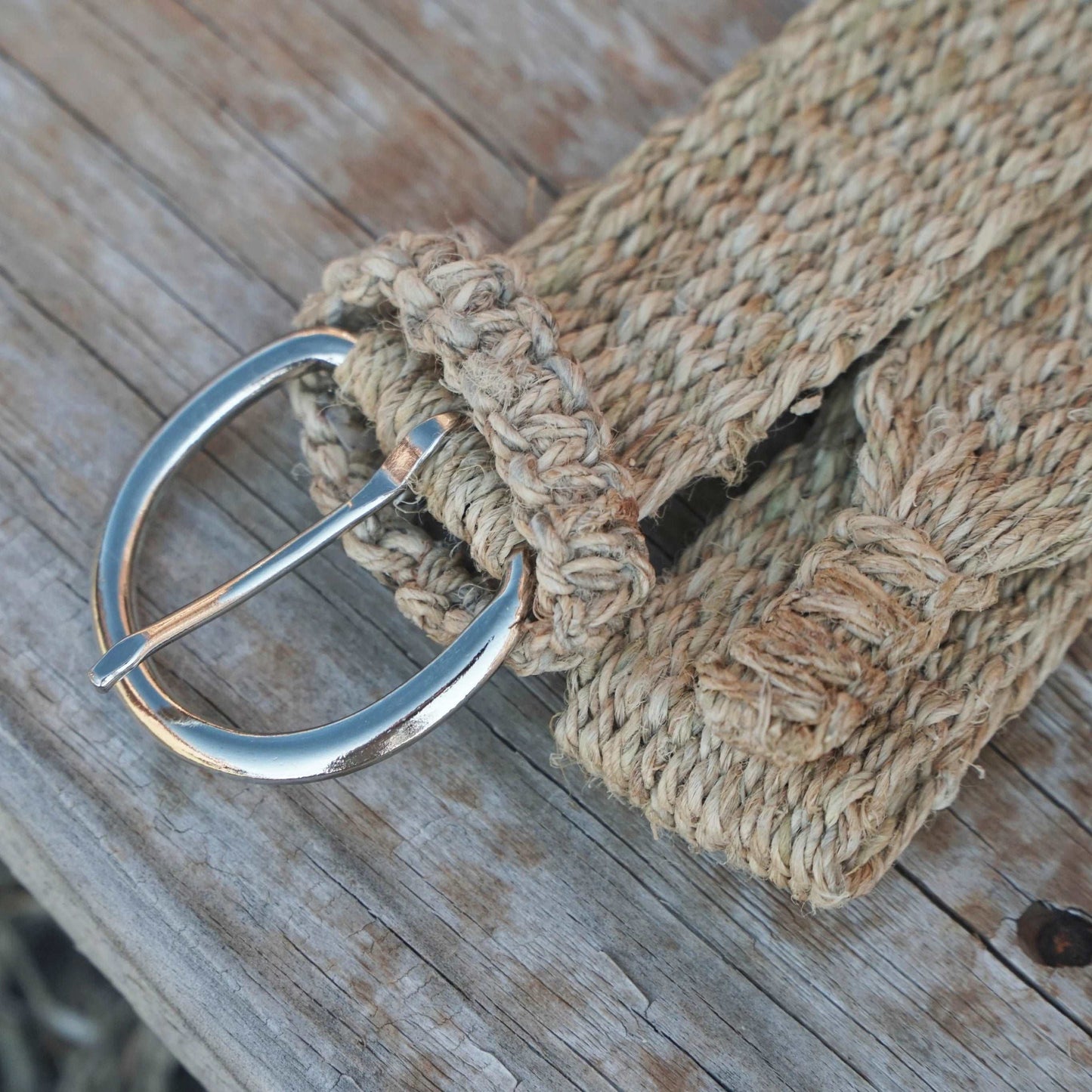 Close-up view of the durable pin buckle and the intricate hemp weave texture.