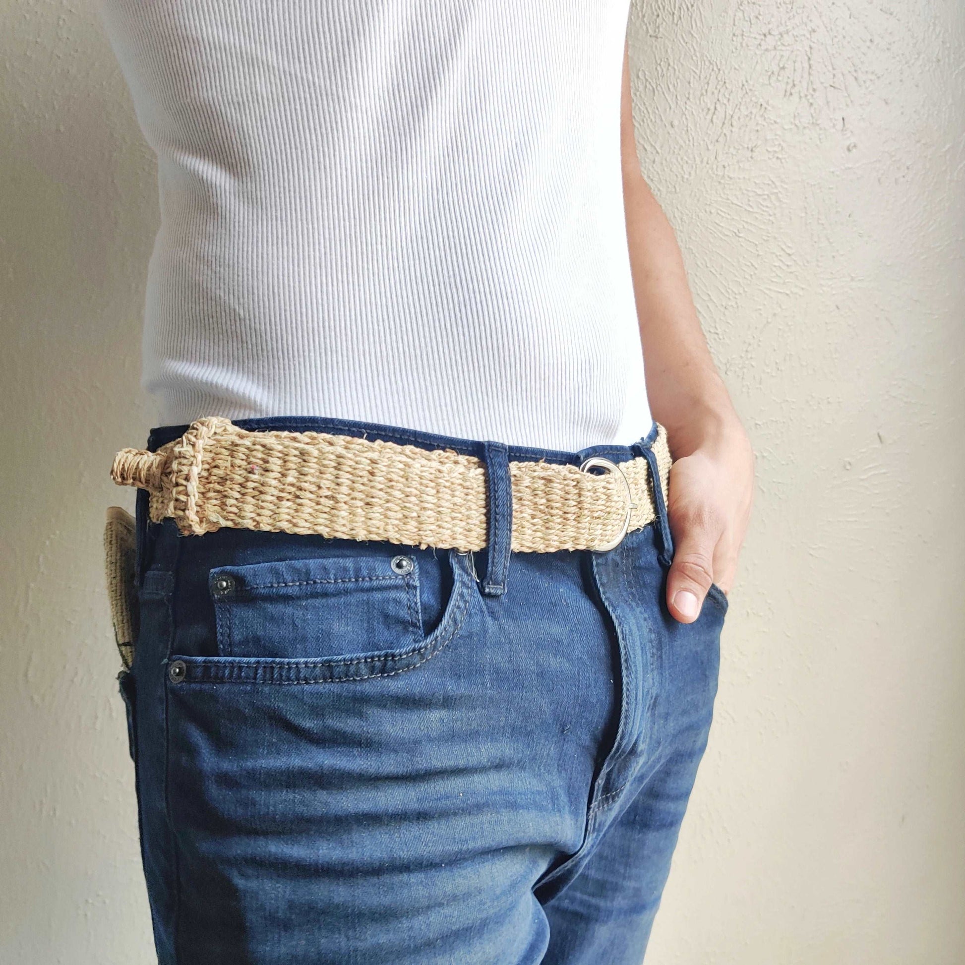Organic hemp belt paired with jeans and a tank for a stylish look.